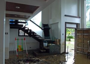 water and mud inside the house